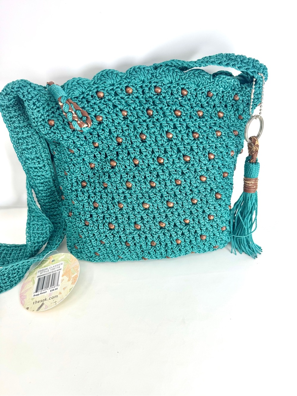 The Sak Teal Crochet Crossbody with Tassel and Studs